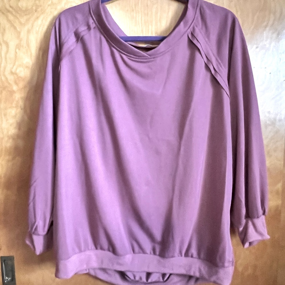Mauve sweatshirt.